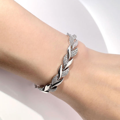 Warm Fortune Twisted Leaf Link Bracelet for Women, Silver-Tone 7 Inch Adjustable Chain with Sparkling Pave Accents