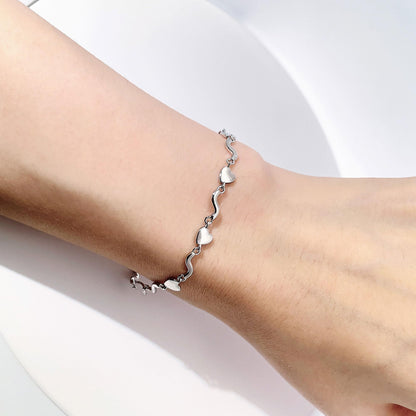 Warm Fortune Heart and Wave Link Bracelet for Women, Silver-Tone 5 Inch Adjustable Chain, Romantic Everyday Jewelry