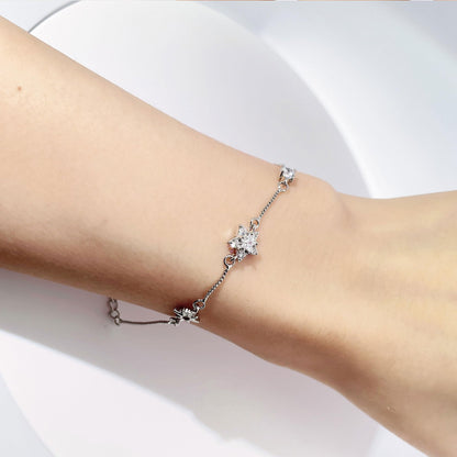 Warm Fortune Star Station Bracelet for Women, Silver-Tone 6 Inch Adjustable Chain with Sparkling Round Stone Accents
